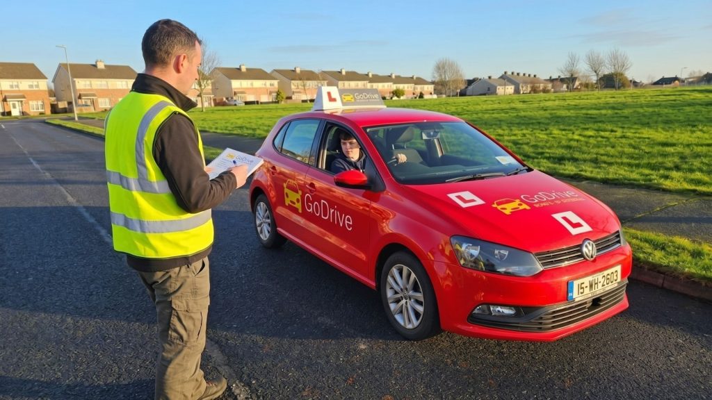 GoDrive driving instructor with a learner in Galway